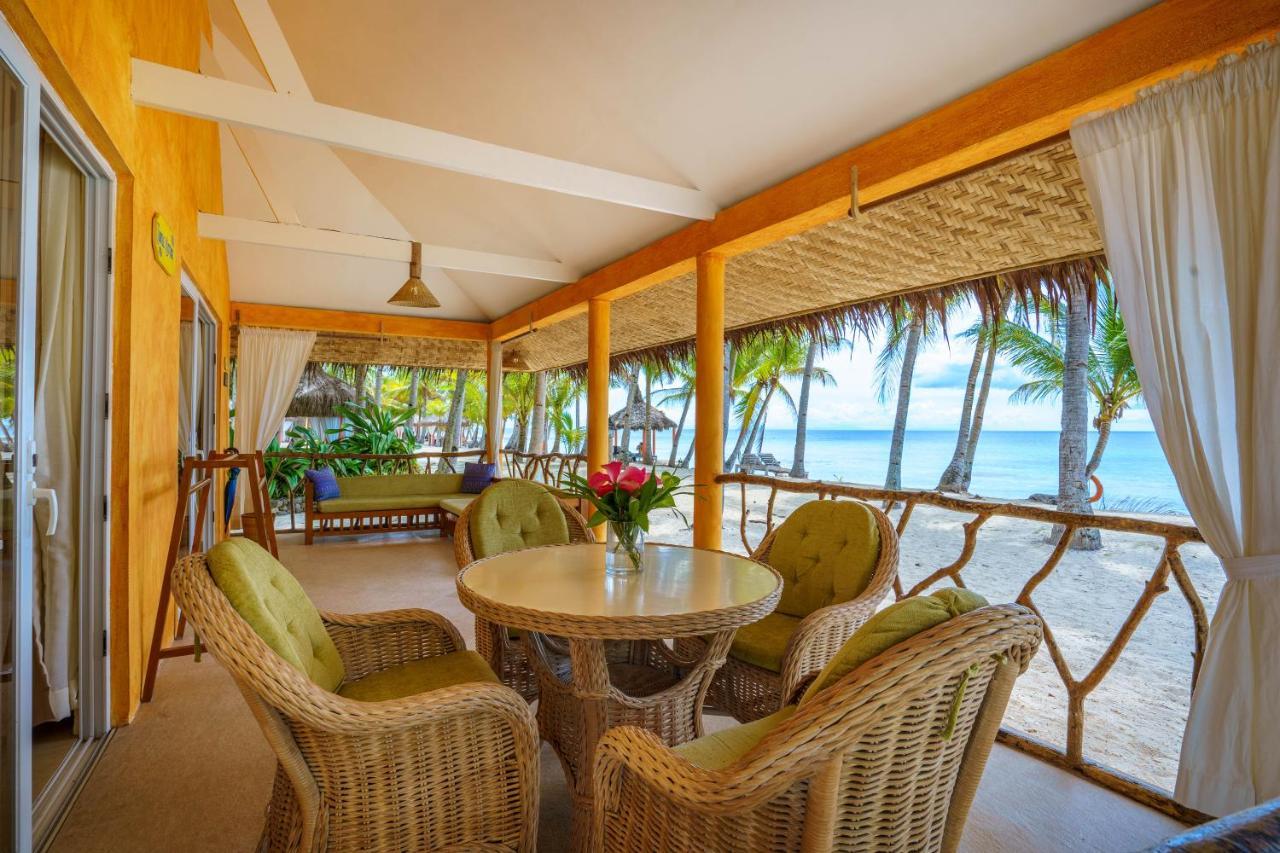 Coco Grove Beach Resort, Siquijor Island Εξωτερικό φωτογραφία A veranda