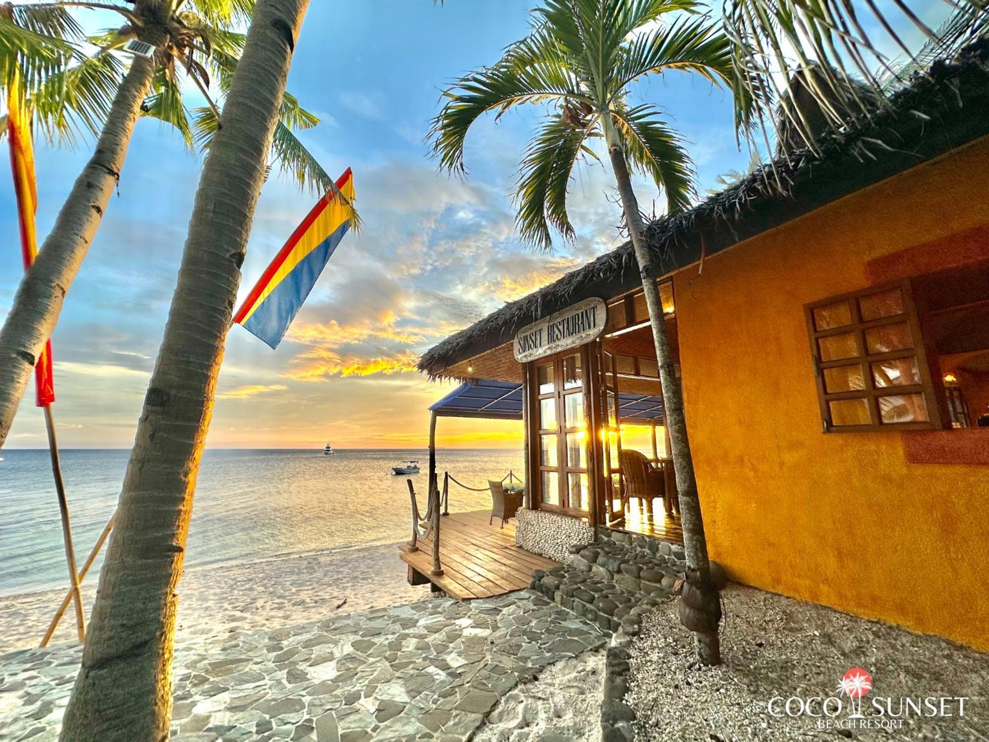 Coco Grove Beach Resort, Siquijor Island Εξωτερικό φωτογραφία Sunset at the beach
